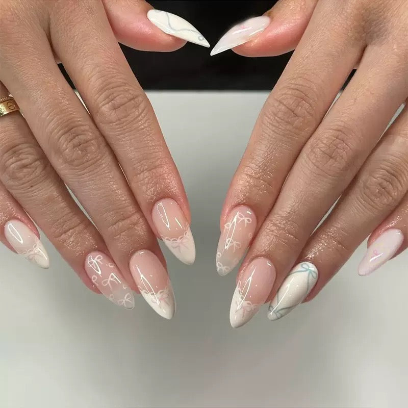 Vembley Elegant Yellow Bow Almond Press On Nails with Soft Nude Gloss Finish