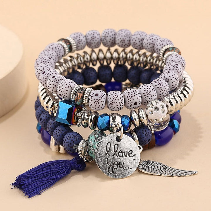 Vembley Trendy Bohemian Bracelet Stack with silver beads, tassel charm, and love pendant for women and girls