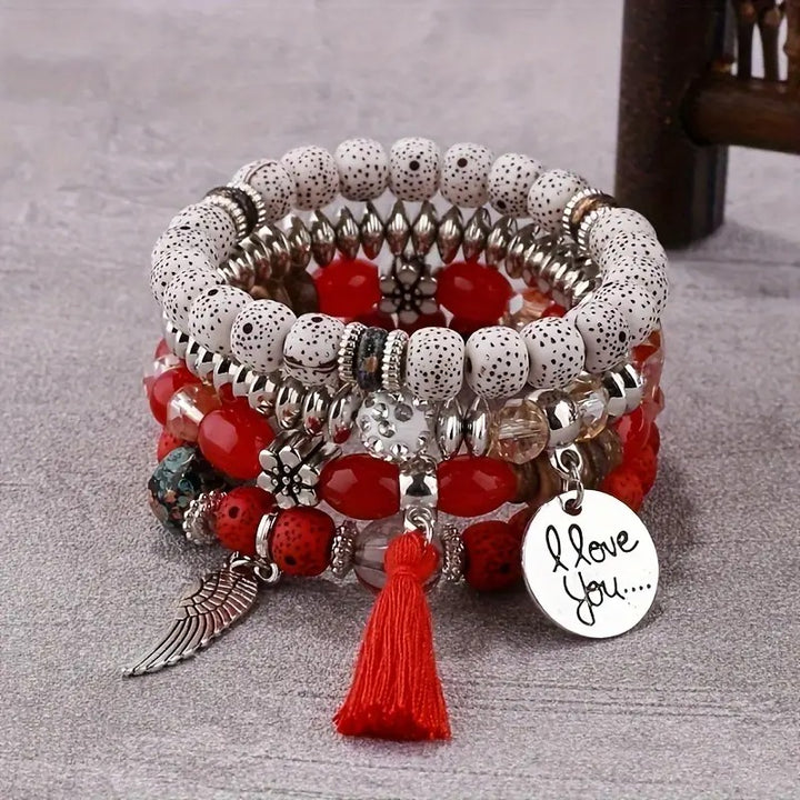 Vembley Trendy Bohemian Bracelet Stack with silver beads, tassel charm, and love pendant for women and girls