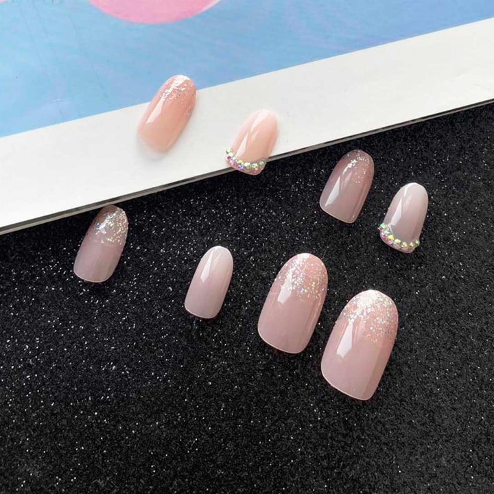 Vembley Set of 24 Artificial Reusable Nails in Pink with crushed glitter tips with glue