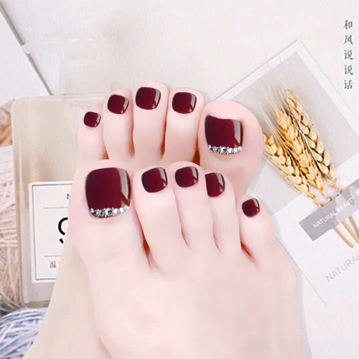 Vembley Set of 24 Artificial Reusable Toe Nails in Maroon Red colour With Glue And Stickers