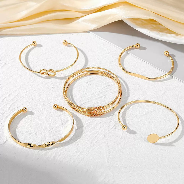 Vembley Trendy 5-Piece Golden Cuff Bracelet Set with Minimalist Knot, Disc and Geometric Designs