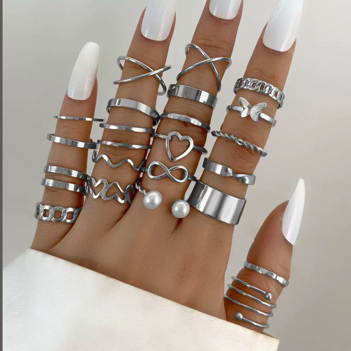 Vembley Elegant Silver Stacked Ring Collection Featuring Butterfly, Infinity, Pearl and Modern Minimalist Statement Bands