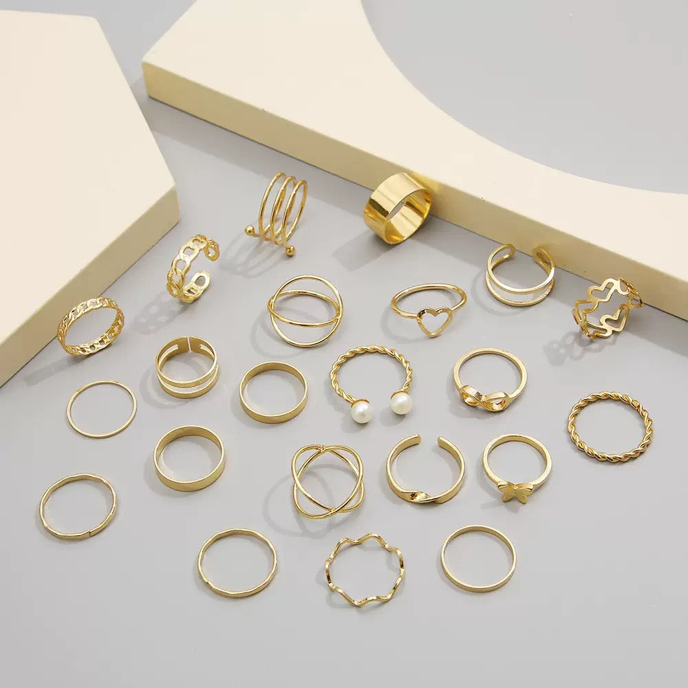Vembley Elegant Gold Stacked Ring Collection Featuring Butterfly, Infinity, Pearl and Modern Minimalist Statement Bands