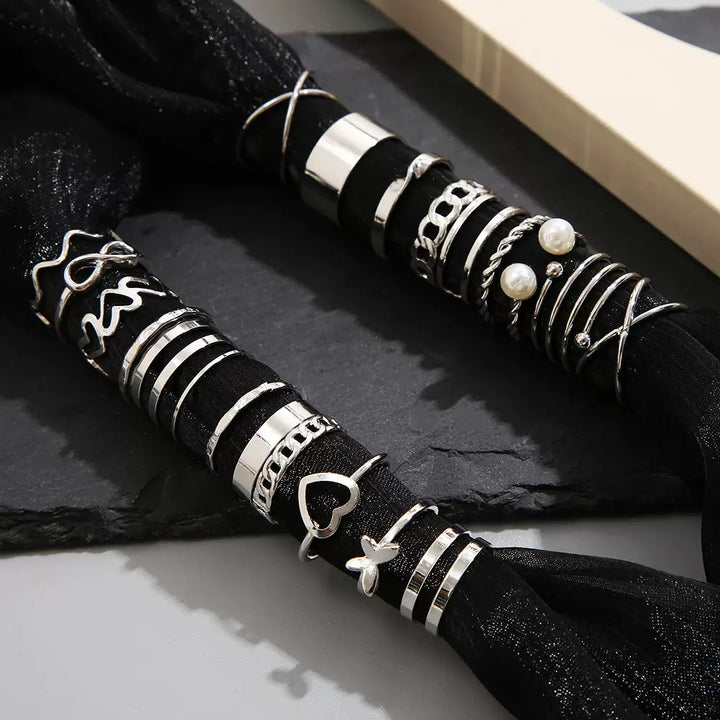 Vembley Elegant Silver Stacked Ring Collection Featuring Butterfly, Infinity, Pearl and Modern Minimalist Statement Bands