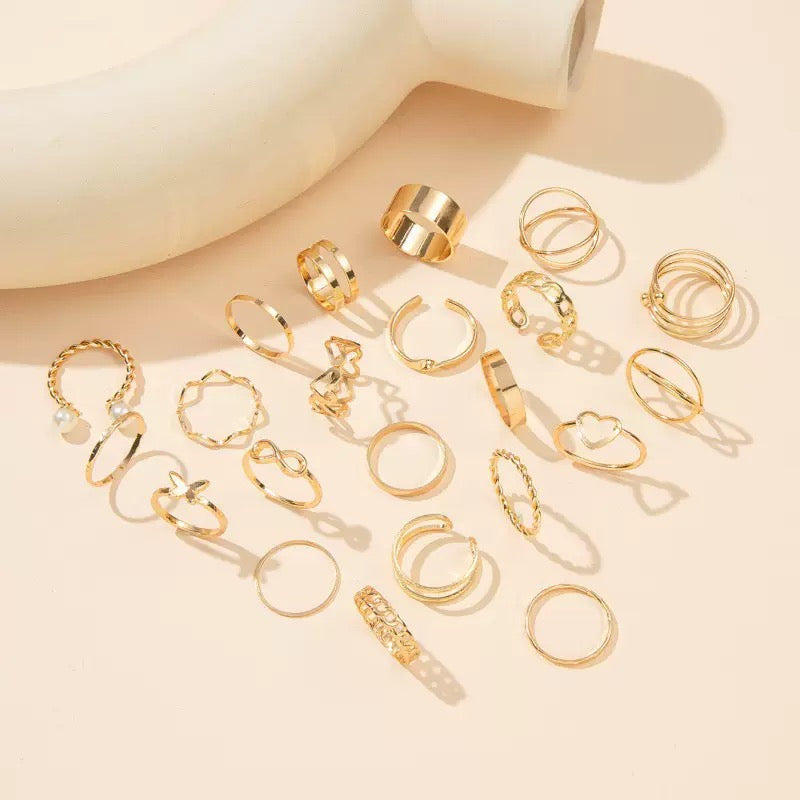 Vembley Elegant Gold Stacked Ring Collection Featuring Butterfly, Infinity, Pearl and Modern Minimalist Statement Bands