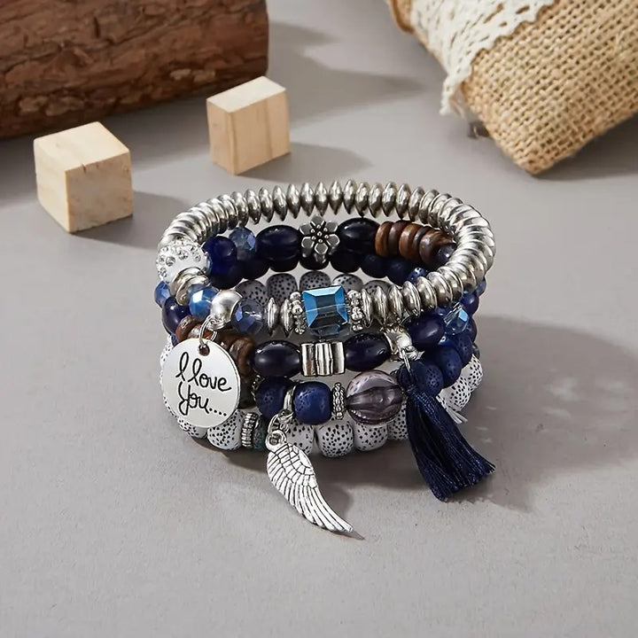 Vembley Trendy Bohemian Bracelet Stack with silver beads, tassel charm, and love pendant for women and girls
