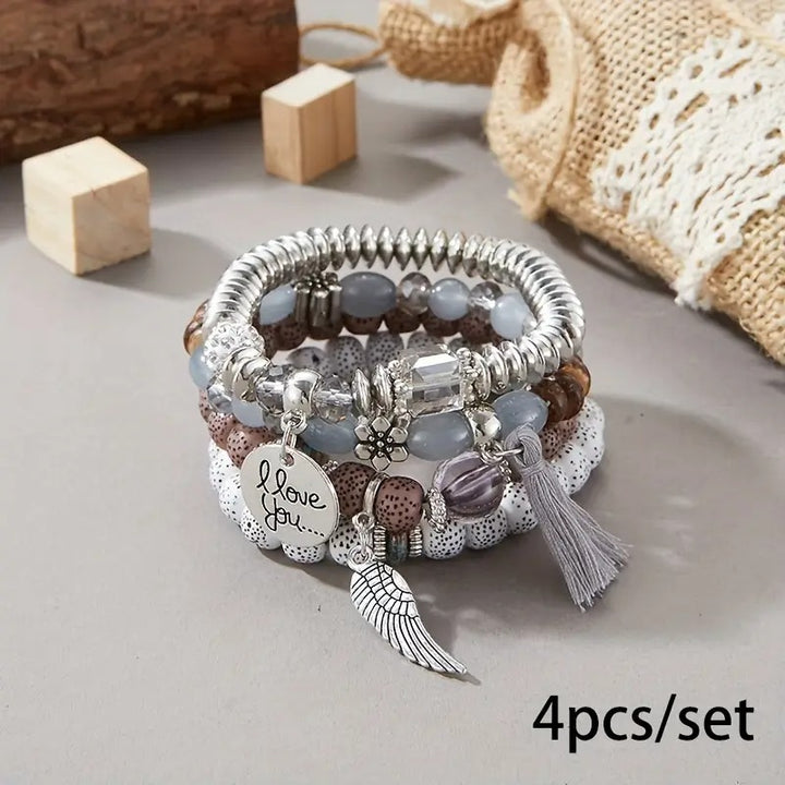 Vembley Trendy Bohemian Bracelet Stack with silver beads, tassel charm, and love pendant for women and girls