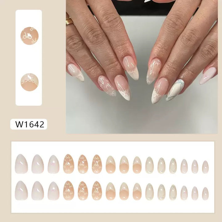 Vembley Elegant Yellow Bow Almond Press On Nails with Soft Nude Gloss Finish