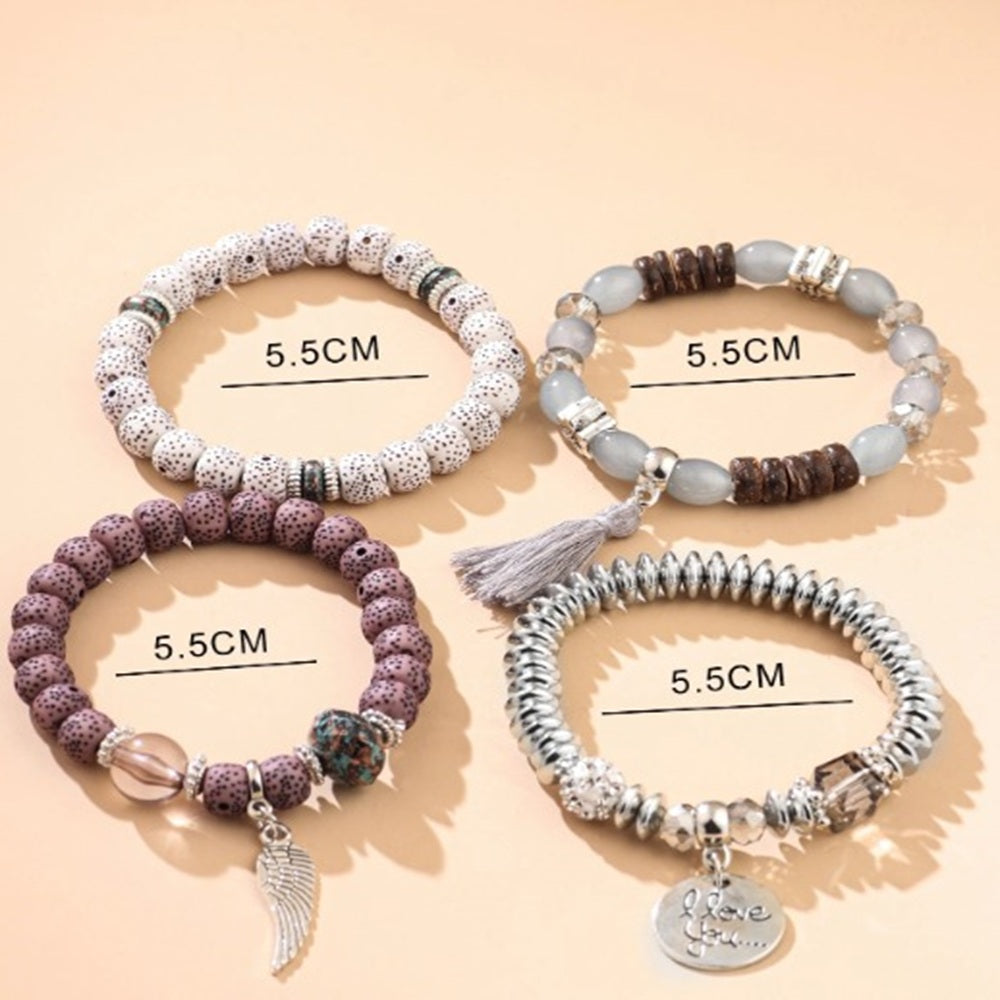 Vembley Trendy Bohemian Bracelet Stack with silver beads, tassel charm, and love pendant for women and girls