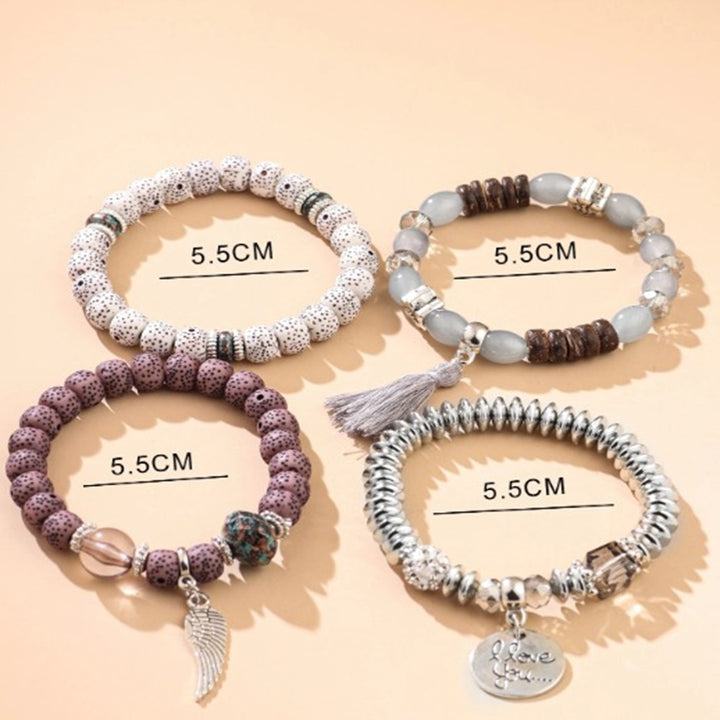 Vembley Trendy Bohemian Bracelet Stack with silver beads, tassel charm, and love pendant for women and girls