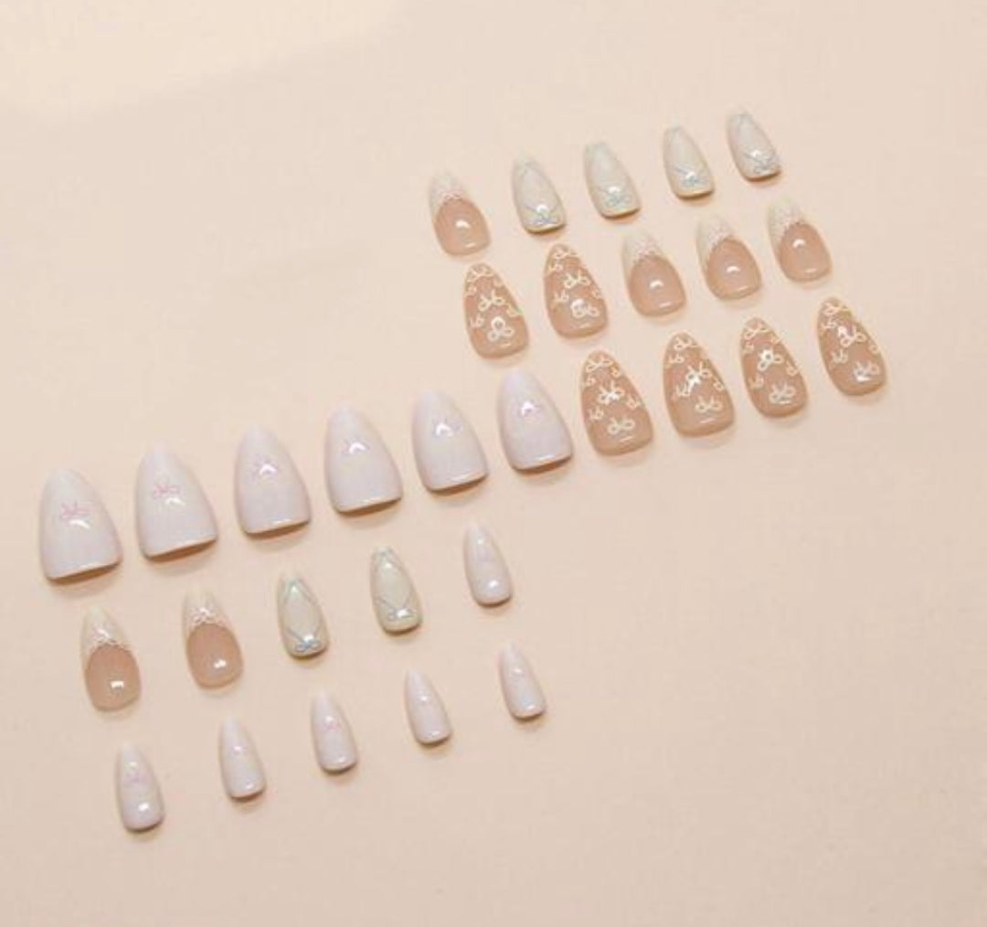 Vembley Elegant Yellow Bow Almond Press On Nails with Soft Nude Gloss Finish