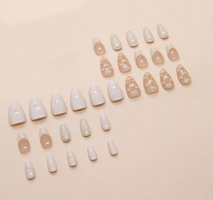 Vembley Elegant Yellow Bow Almond Press On Nails with Soft Nude Gloss Finish