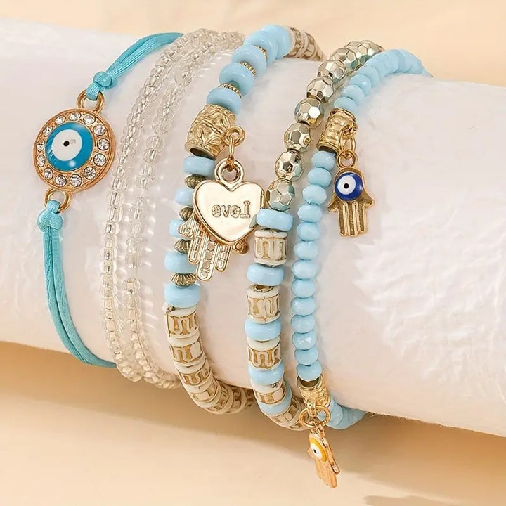 Vembley Elegant Bohemian 6 Bracelet Set featuring Evil Eye, Hamsa charms, beaded layers, adjustable cord, and metallic accents bracelet for women and girls