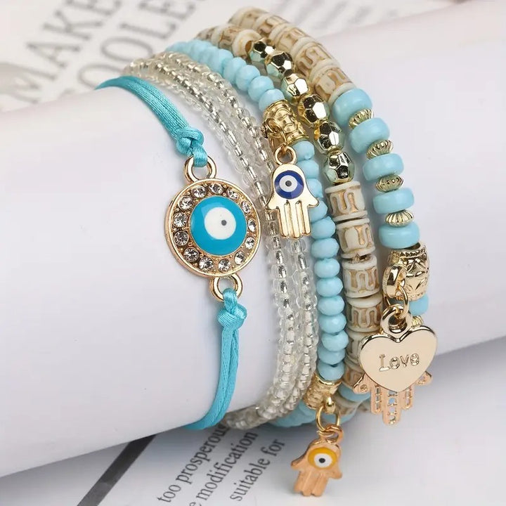 Vembley Elegant Bohemian 6 Bracelet Set featuring Evil Eye, Hamsa charms, beaded layers, adjustable cord, and metallic accents bracelet for women and girls