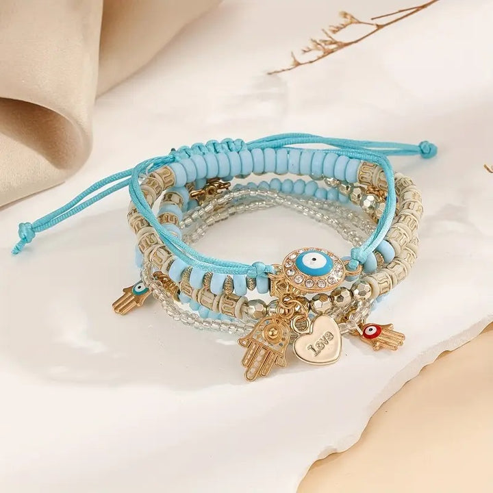 Vembley Elegant Bohemian 6 Bracelet Set featuring Evil Eye, Hamsa charms, beaded layers, adjustable cord, and metallic accents bracelet for women and girls