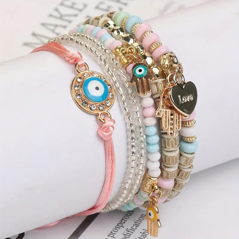 Vembley Elegant Bohemian 6 Bracelet Set featuring Evil Eye, Hamsa charms, beaded layers, adjustable cord, and metallic accents bracelet for women and girls