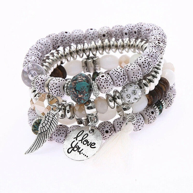 Vembley Trendy Bohemian Bracelet Stack with silver beads, tassel charm, and love pendant for women and girls