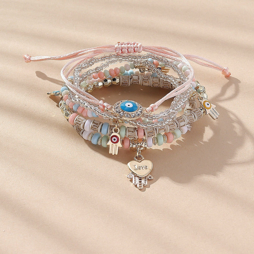 Vembley Elegant Bohemian 6 Bracelet Set featuring Evil Eye, Hamsa charms, beaded layers, adjustable cord, and metallic accents bracelet for women and girls