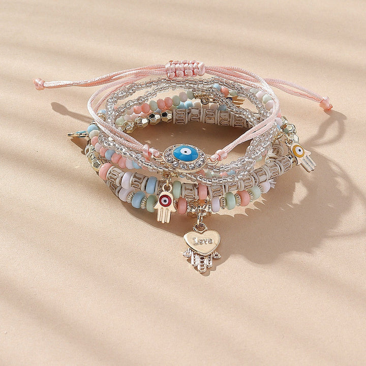 Vembley Elegant Bohemian 6 Bracelet Set featuring Evil Eye, Hamsa charms, beaded layers, adjustable cord, and metallic accents bracelet for women and girls