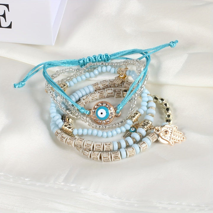 Vembley Elegant Bohemian 6 Bracelet Set featuring Evil Eye, Hamsa charms, beaded layers, adjustable cord, and metallic accents bracelet for women and girls