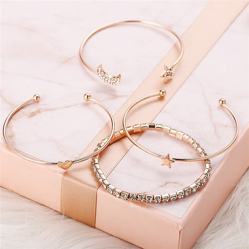 ZAVERI PEARLS Gold Tone Dazzling Diamonds Moon & Stars Classy Charm Bracelet  For Women-ZPFK15029 : Amazon.in: Fashion