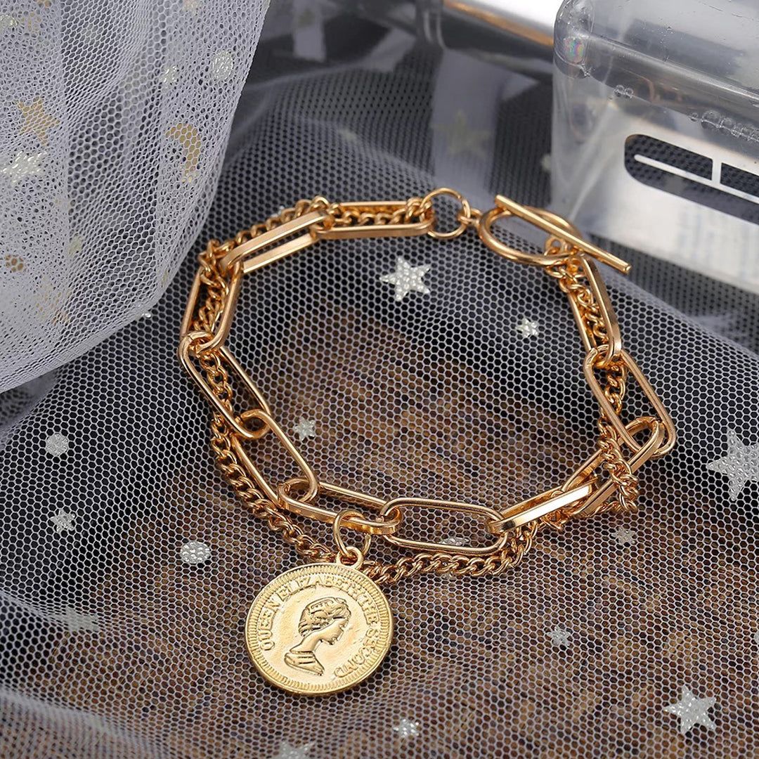 Lot 222: Gold Coin Bracelet incl. $5 Liberty & Gold Peso | Case Auctions