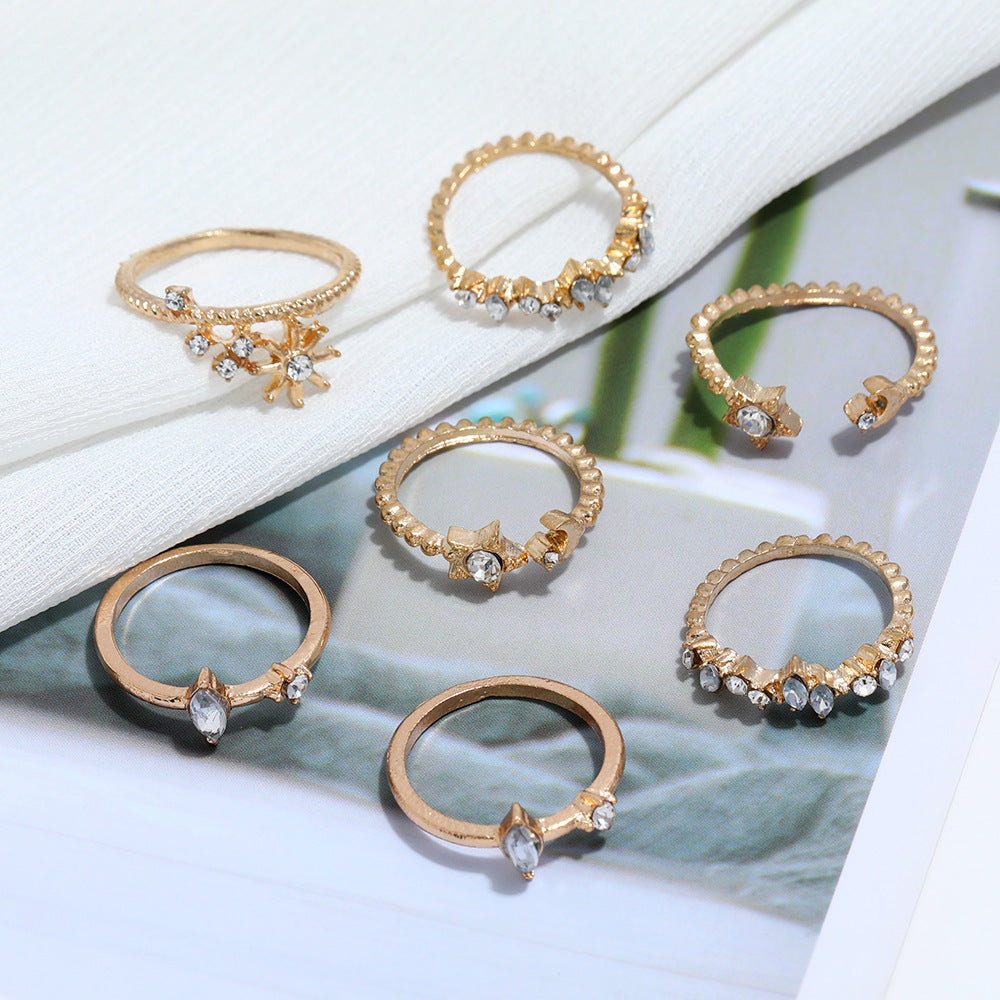 Golden Seven Piece White Crystal Multi Designs Ring Set
