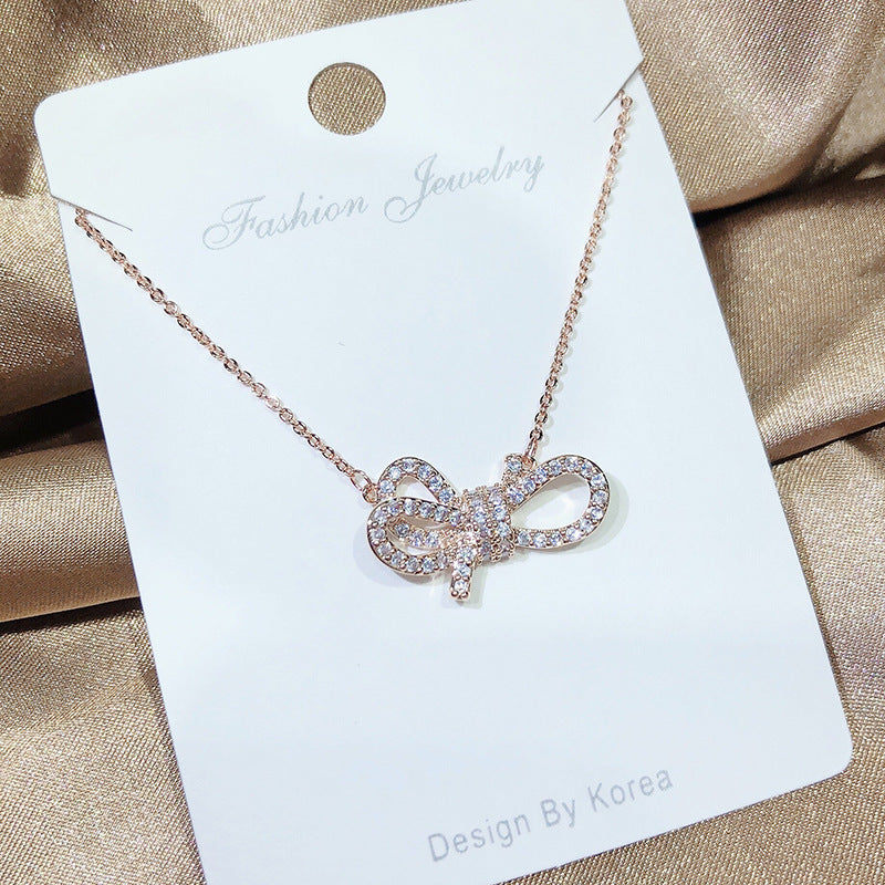 Vembley Charming Rosegold Plated with the Design of Ribbon Pendant Necklace For Women and Girls - Vembley