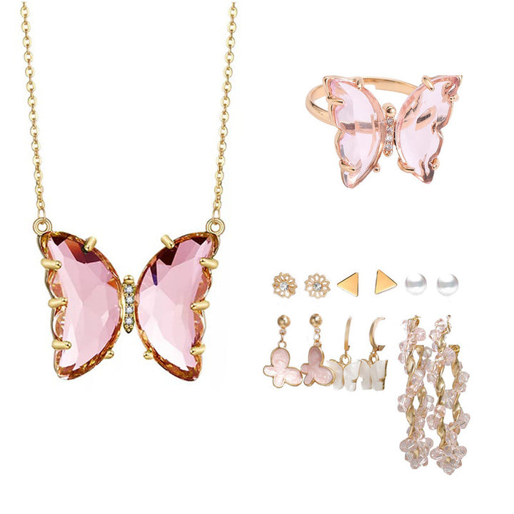 Vembley Combo Of Pink Crystal Butterfly Pendant Necklace and Earrings With Ring For Women and Girls